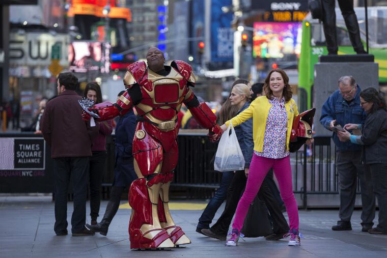 Tituss Burgess and Ellie Kemper in a scene from Netflix's "Unbreakable Kimmy Schmidt."