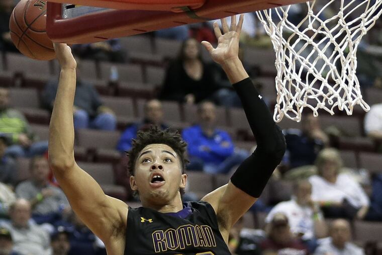 Roman Catholic's Seth Lundy scored his 1,000th career point Friday night against La Salle.