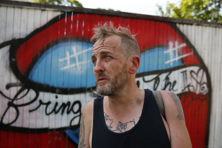 Gregory Antczak, 35, who said he uses fentanyl, pauses along Kensington and Indiana Avenues.