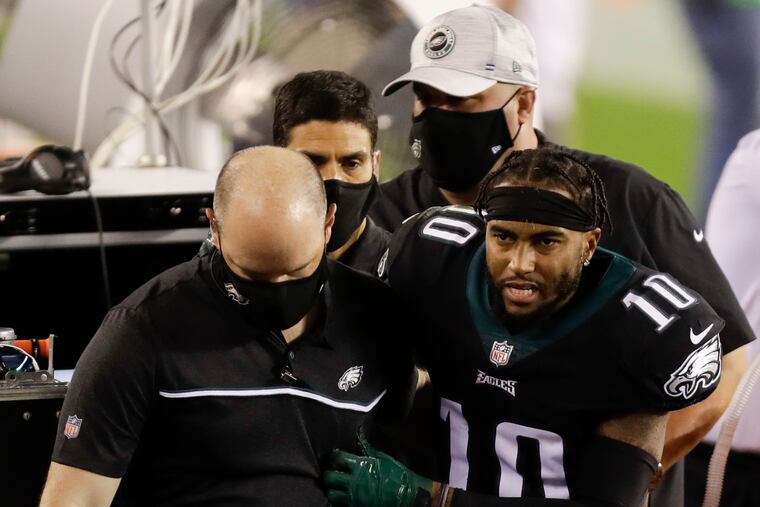 Eagles DeSean Jackson gets medical help after getting injuring attempting to return a punt against the New York Giants on Thursday.
