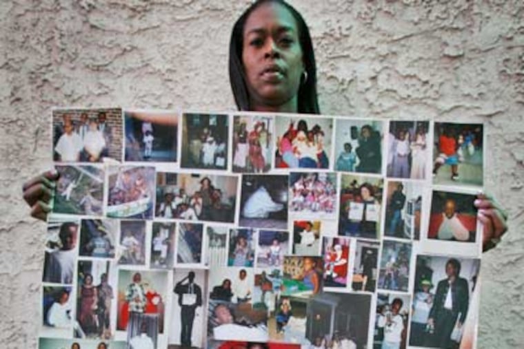 Marie Clarke with a photo collage recalling her slain son, Antonio. (Alejandro A. Alvarez / Staff Photographer)