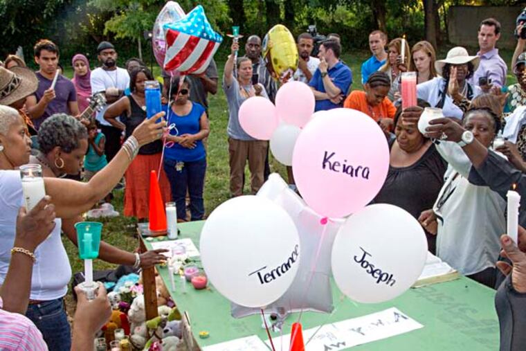 A memorial July 26, 2014 at the corner of Allegheny and Germantown Aves where three children were killed -- Keiara, Joseph and Terrance -- when a out-of-control carjacked SUV ran them over as they sold cold drinks yesterday. ( CLEM MURRAY / Staff Photographer )