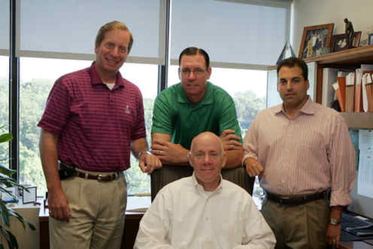 "It's the money that keeps the lights on and the doors open for the first year or two. This region is critically short on early-stage investors," says private- equity man Glenn Rieger (left), with NewSpring Capital colleagues Michael A. DiPiano (front), Marc R. Lederman, and Jonathan S. Schwartz (right).