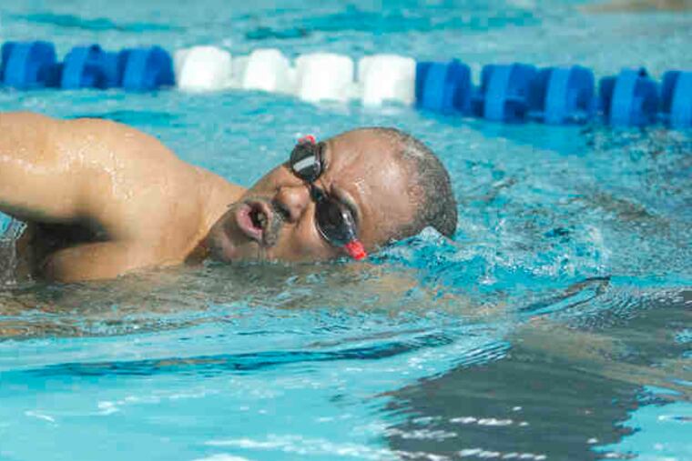 Municipal Judge James M. DeLeon swims laps at the new Salvation Army Kroc Center in North Philadelphia's Nicetown section. DeLeon, who teaches youth swimmers, is a firm booster of the $72 million center. "Come and look at it," he says. "You'll be amazed. It's really great." Story, B2.