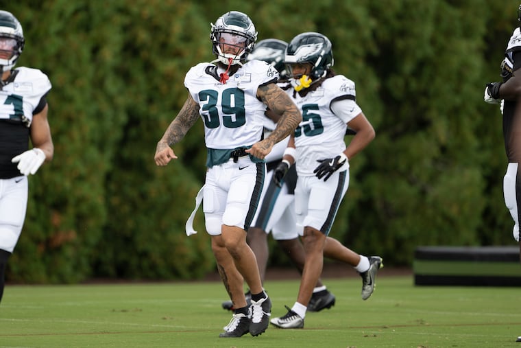 Marcus Epps, center, at the NovaCare Complex on Aug. 28.