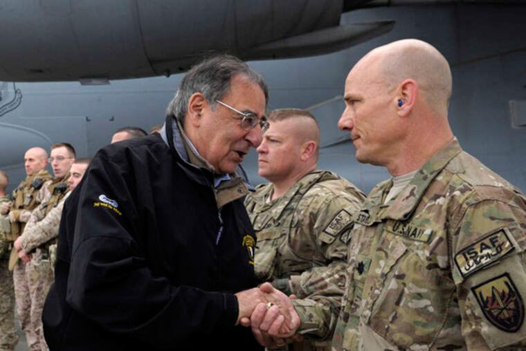 Before leaving Afghanistan for Washington on Friday, Defense Secretary Leon E. Panetta shook hands with some of the troops in Kabul. SUSAN WALSH / AP, Pool