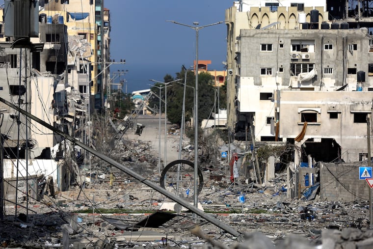A damaged neighborhood following Israeli airstrikes on Gaza City, Monday, Oct. 23, 2023.