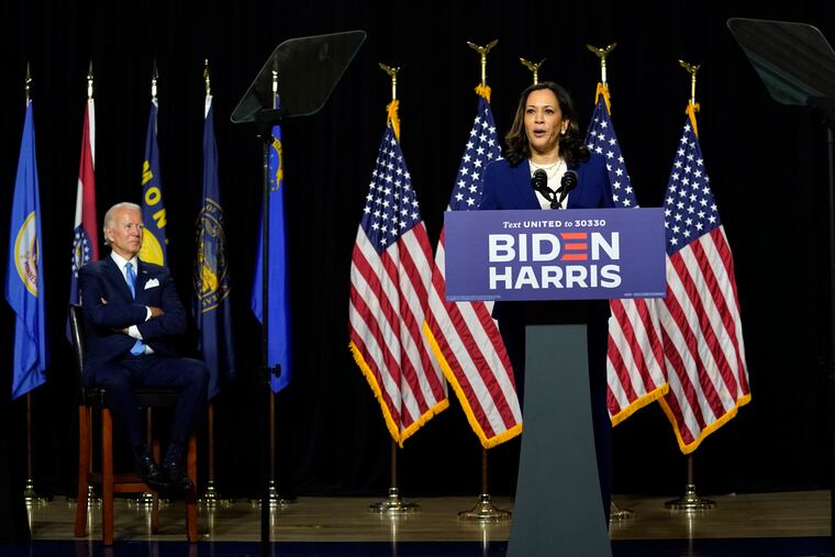 Sen. Kamala Harris (D., Calif.), speaks alongside Joe Biden during a campaign event at Alexis Dupont High School in Wilmington on Wednesday.