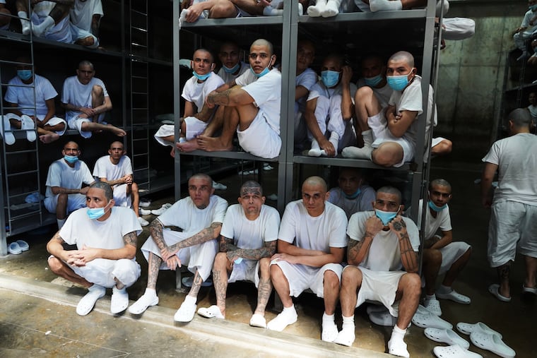 Prisoners sit inside a cell at the megaprison known as Detention Center Against Terrorism (CECOT) in Tecololuca, El Salvador, Friday, Jan. 30, 2026.
