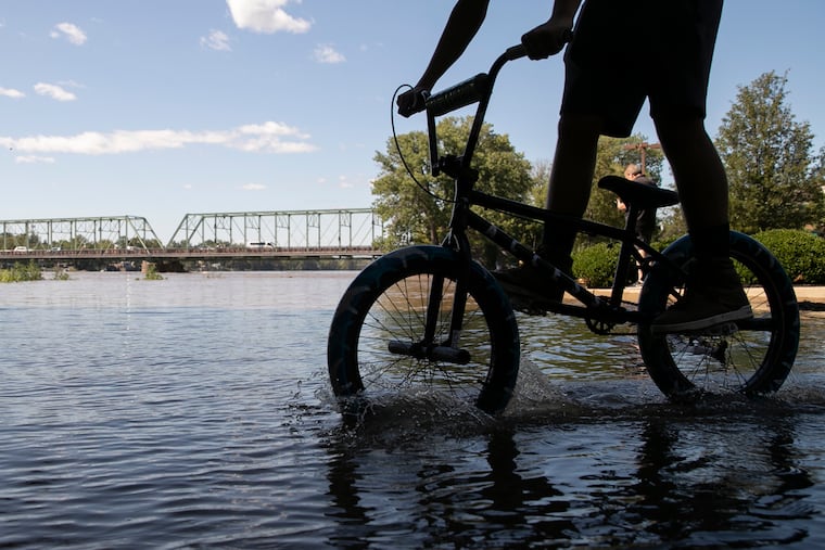 The rising waters of the Delaware River from the parking lot of the Riverside Ballroom in Lambertville, N.J., in the aftermath of Ida on Sept. 2, 2021.