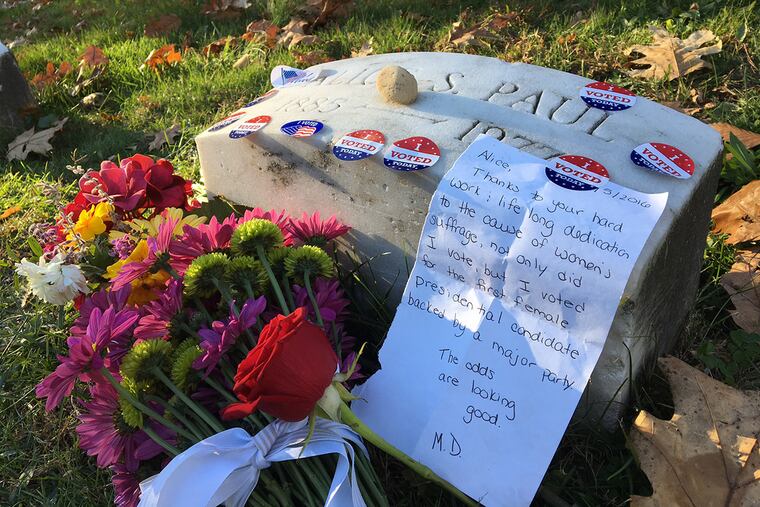 Tributes and flowers piled up at the gravesite of suffragist Alice Paul at the Westfield Friends Cemetery in Cinnaminson NJ.