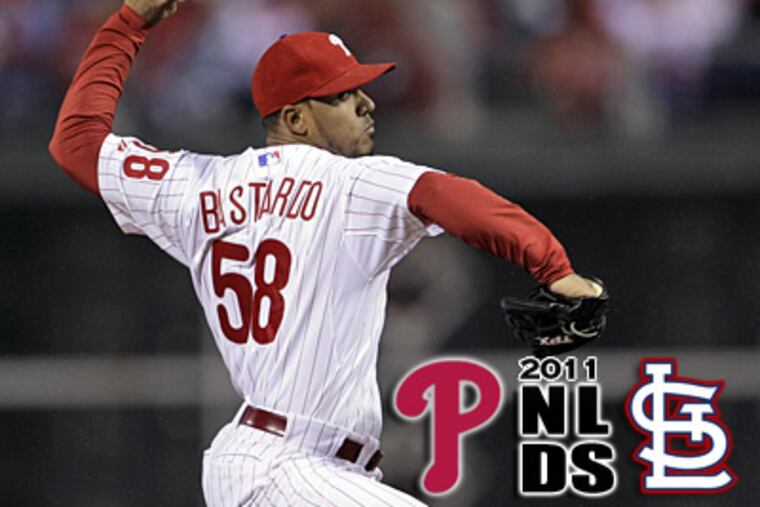 Antonio Bastardo throws a pitch during the eighth inning of Game 2 against the Cardinals. (AP Photo/Matt Slocum)
