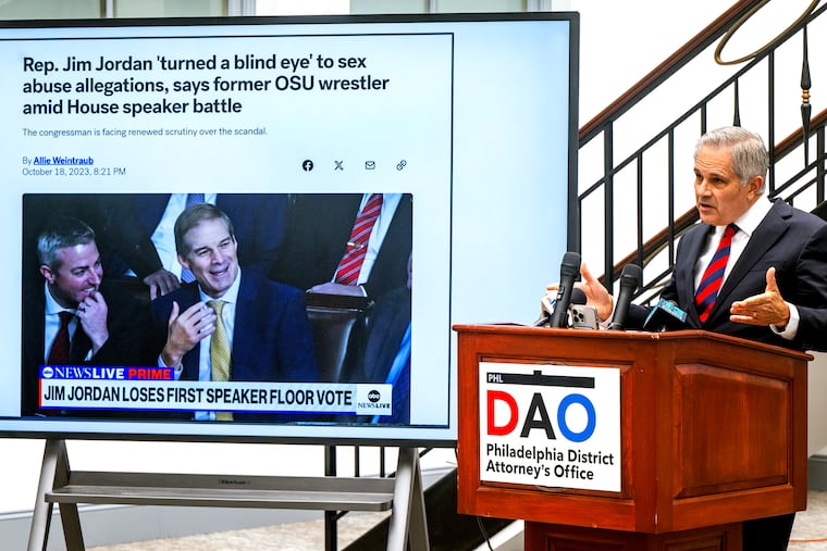 District Attorney Larry Krasner at a news conference Wednesday, denouncing criticism of his office's immigration policies leveled by Republican members of the House Judiciary Committee, and its chairman, Rep. Jim Jordan (on screen).