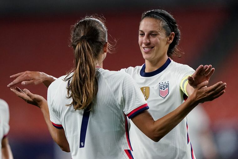 Carli Lloyd (right) scored five goals in the U.S.' win.
