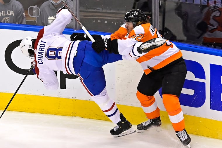 Flyers right winger Nic Aube-Kubel (62) hitting Montreal's Ben Chiarot during a playoff game in Toronto on Aug. 12.