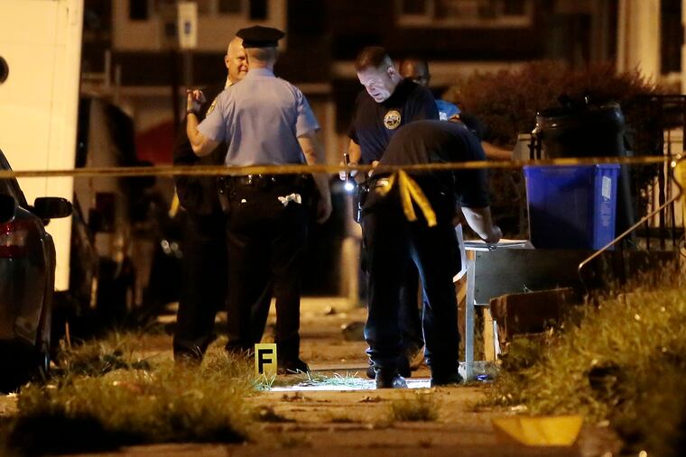 Philadelphia Police on the 2600 block of Carroll St. in Philadelphia where at least 6 people were shot just after 8 pm on July 28, 2019.