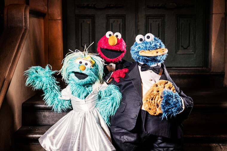 Cookie Monster, right, focuses his attention by thinking about a story he recently read, singing a song, and taking a deep belly breath before eating freshly baked cookies. MUST CREDIT: Photo for The Washington Post by Mark Mann