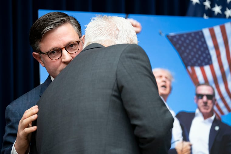 House Speaker Mike Johnson (R., La.) speaks with Oversight Committee Chairman Rep. James Comer (R., Ky.) at a House Oversight hearing on the attempted assassination of Donald Trump in July.