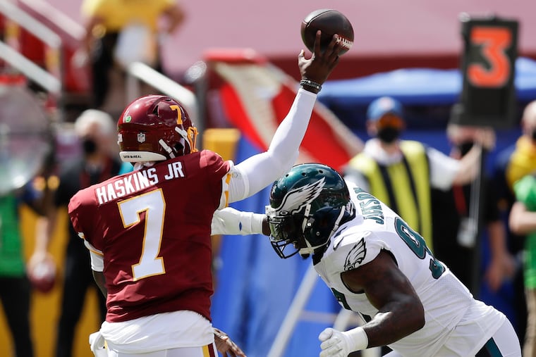 Eagles defensive tackle Malik Jackson goes after Washington quarterback Dwayne Haskins during the first quarter.