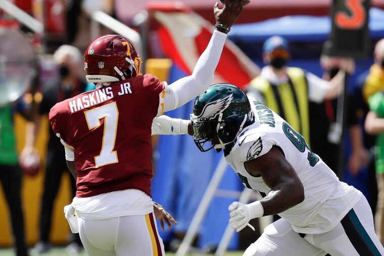 Eagles defensive tackle Malik Jackson goes after Washington quarterback Dwayne Haskins during the first quarter Sunday.