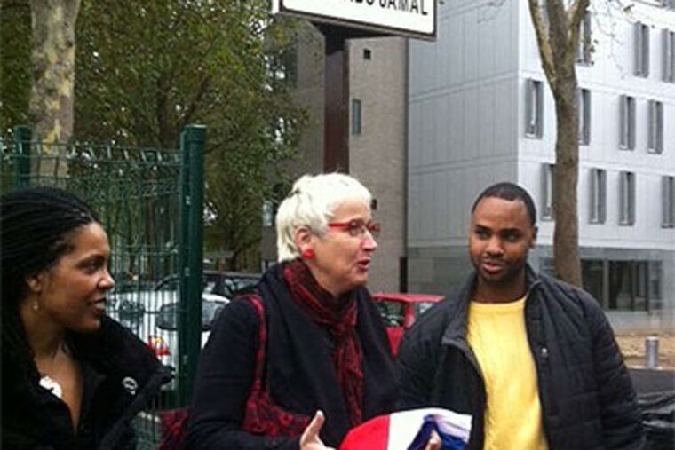 Bobigny Mayor Catherine Peyge (center) opens Rue Mumia Abu-Jamal, as Mumia's son Jamal (right) looks on. (Linn Washington / For the Daily News)