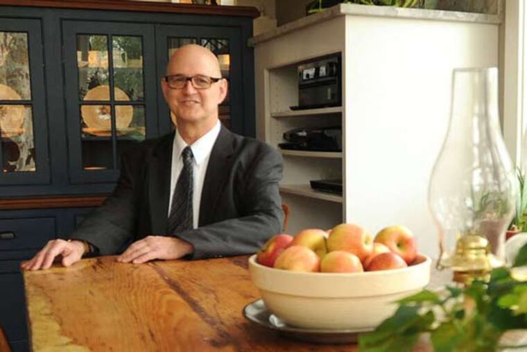Don Tenenblatt in the rebuilt kitchen/dining area of his rehabbed 1800 farmhouse in Pipersville, Bucks County.