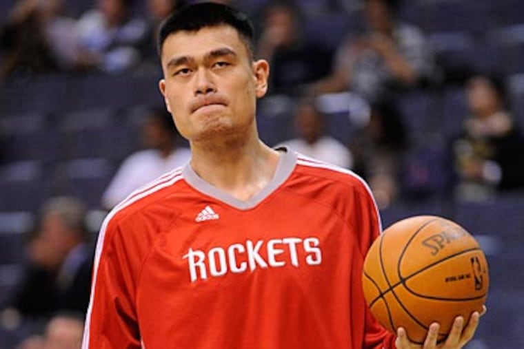 Center Yao Ming retired after an eight-year career with the Houston Rockets. (Nick Wass/AP)