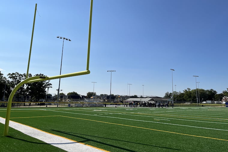 A new synthetic turf football field is part of a renovated youth sports facility at Whitman Park in Camden. The football field used to be a contaminated medical laboratory complex that was razed and cleaned.