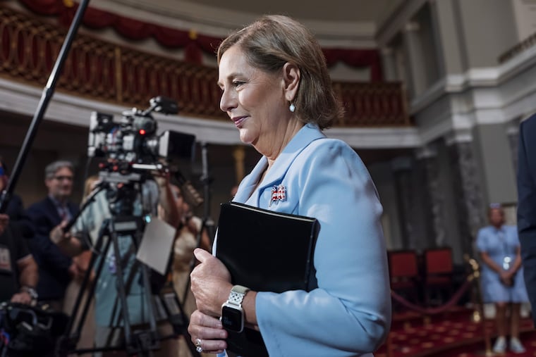 Newly-sworn Sen. Darline Graham (R., S.C.), sister of Lindsey Graham, walks past cameras as she leaves the Old Senate Chamber following an oath of office ceremony allowing her to serve as her late brother's temporary replacement, at the Capitol in Washington, Tuesday, July 14, 2026,