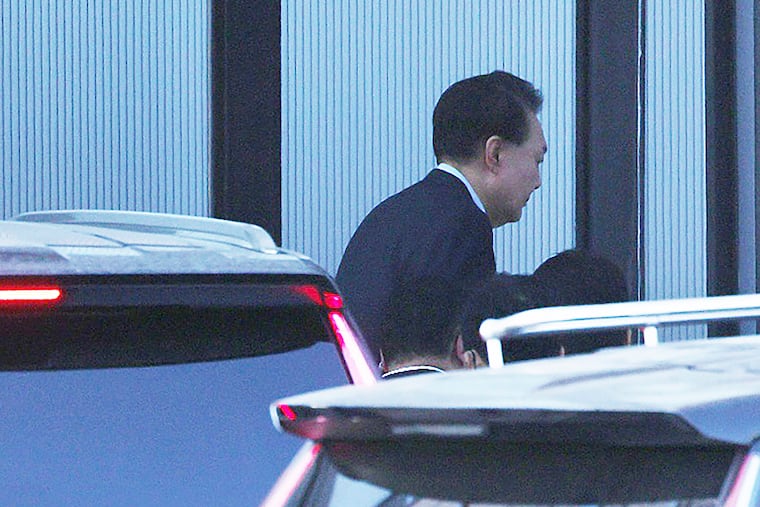 Impeached South Korean President Yoon Suk Yeol arrives at the Corruption Investigation Office for High-Ranking Officials in Gwacheon, South Korea, on Wednesday, Jan. 15, 2025.