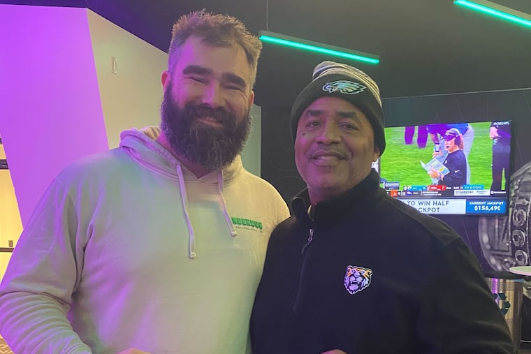 Jason Kelce with Mike Jones, his football coach at Cleveland Heights High, after the Eagles defeated the Buffalo Bills on Nov. 26, 2023 at Lincoln Financial Field.