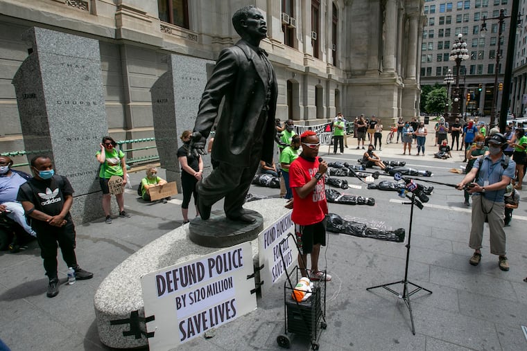 Jamaal Henderson with ACT UP Philadelphia opened the rally against the funding of Philadelphia police in place of communities. The rally was held at the Octavius Valentine Catto statue on the south side of City Hall, Philadelphia, on Tuesday, June 16, 2020.