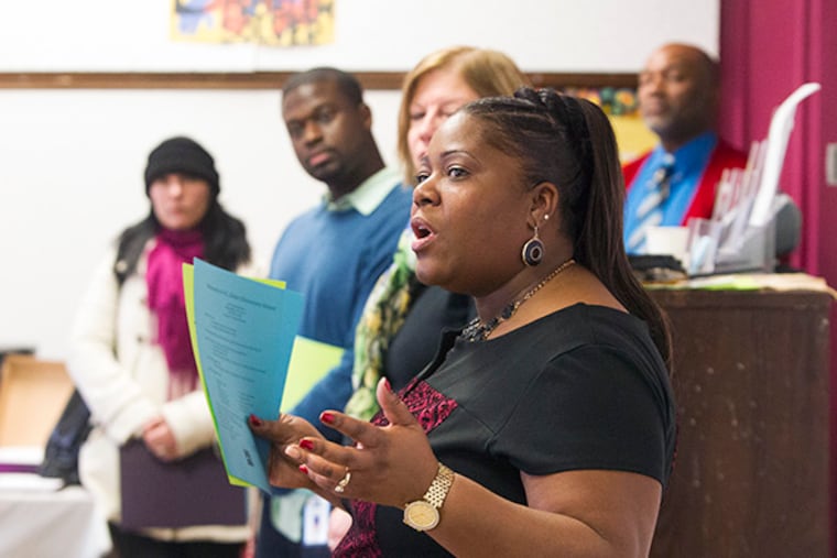 A tour at Emlen Elementary in Mount Airy, where principal Tammy Thomas, front, talked to tour members about the school and its place in the community Wednesday January 7, 2015. ( ED HILLE / Staff Photographer )