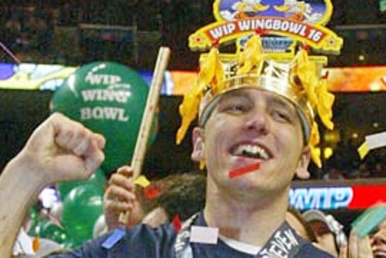 Joey Chestnut held off crowd-pleasing El Wingador for a third eating victory.