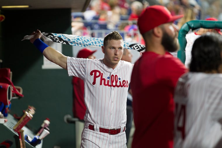 Corey Dickerson, left, of the Phillies stretches in the dugout during the game against the White Sox at Citizens Bank Park on Aug. 2, 2019. Dickerson was used as a pinch hitter.