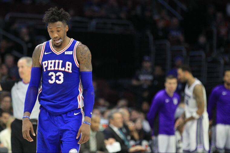 Robert Covington of the Sixers walks down the court dejected late in their game against the Sacramento Kings at the Wells Fargo Center on Dec. 19, 2017. Covington shot 2-13 from the 3-point line. CHARLES FOX / Staff Photographer
