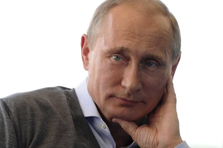 Russian President Vladimir Putin meets with participants in the youth educational forum at the Seliger youth camp near Lake Seliger, some 450 kilometres (281 miles) northwest of Moscow, in Tver region, Russia, Friday, Aug. 29, 2014. (AP Photo/RIA-Novosti, Mikhail Klimentyev, Presidential Press Service)