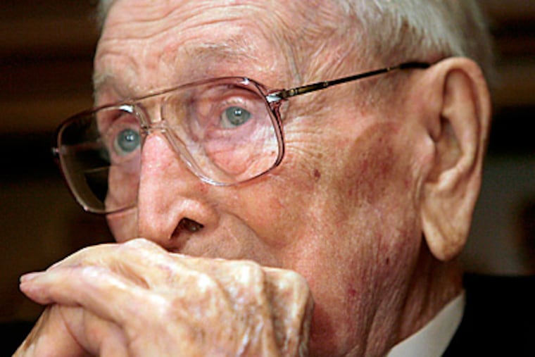 Former UCLA men's basketball coach John Wooden died Friday night. (AP Photo/Nick Ut)