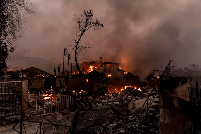 Structures on fire during the Eaton fire in Altadena, Calif., on Wednesday, Jan. 8, 2025.