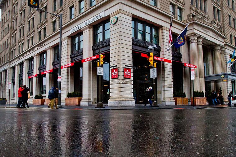 Hotel Monaco, at Fifth and Chestnut, is said to have rooms for the weekend in the mid-$300s. (DAVID M WARREN / File Photograph)