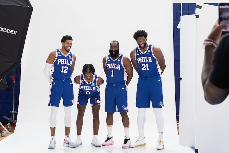 Tobias Harris, Tyrese Maxey, Jame Harden and Joel Embiid pose during media day on Monday.