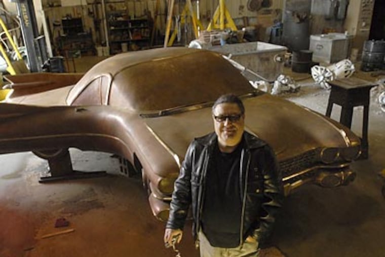 "Automotive sculptor"; Bernardo Corman, of North Jersey, with his piece "CaddyCorner." (April Saul/Staff Photographer)