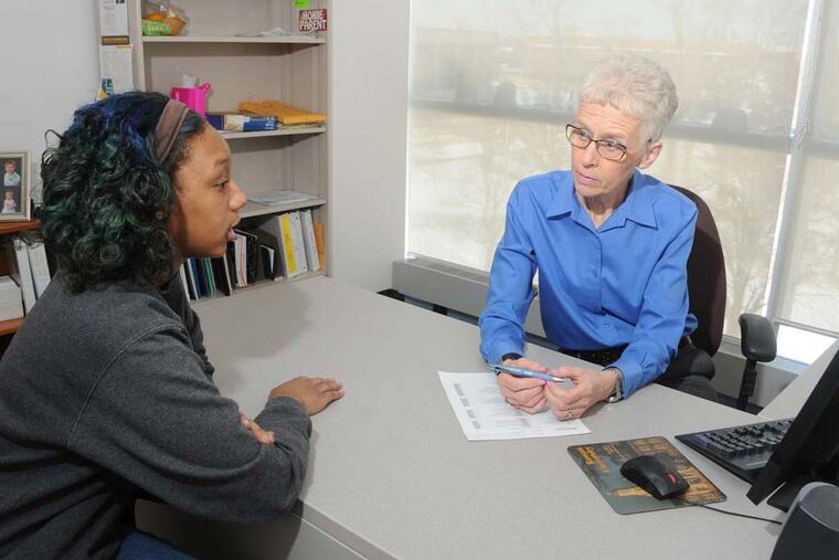 Carol Eigenbrot (R), an advisor at Rowan University in Glassboro, Nj., with student Tanajah Rosenbaum of Newark, Nj. (Curt Hudson / Freelance)