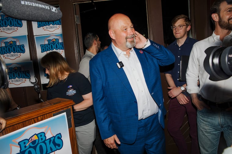 Bob Brooks arrives at his watch party on election night at a bar in Bethlehem, Pa., May 19, 2026. Brooks, a retired firefighter and union leader who amassed support from both moderates and liberals, won the Democratic House primary on Tuesday in a battleground district in Pennsylvania, according to The Associated Press.