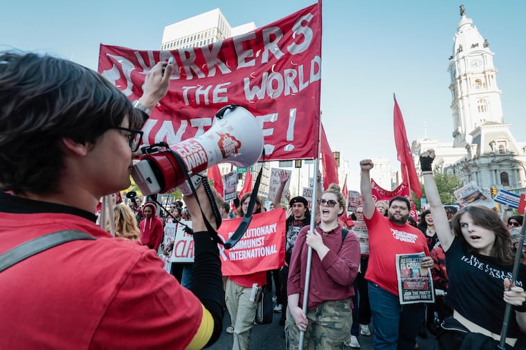 Philadelphians march from City Hall for May Day as they lobby for stronger unions, higher taxes on the wealthy and more affordable housing across the city, on Friday, May 1, 2026.