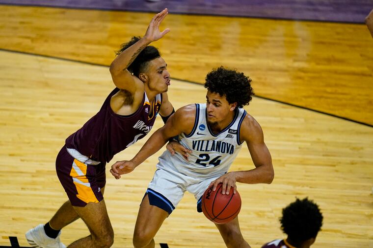 Villanova forward Jeremiah Robinson-Earl (right) is likely another in a long line of Villanova players to advance to the NBA.