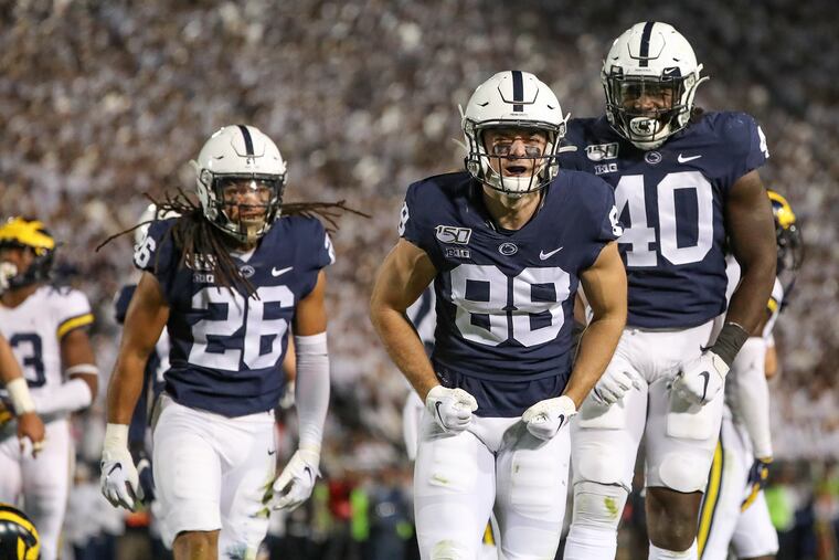 Penn State's Dan Chisena (88) celebrates after bringing down Michigan's Donovan Peoples-Jones on a punt return in the second quarter on Oct. 19, 2019.