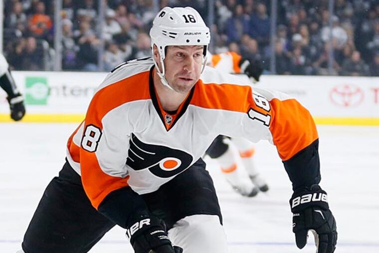 Philadelphia Flyers left wing R.J. Umberger skates with the puck against the Los Angeles Kings during the first period of an NHL hockey game, Saturday, Dec. 6, 2014, in Los Angeles. (Danny Moloshok/AP)