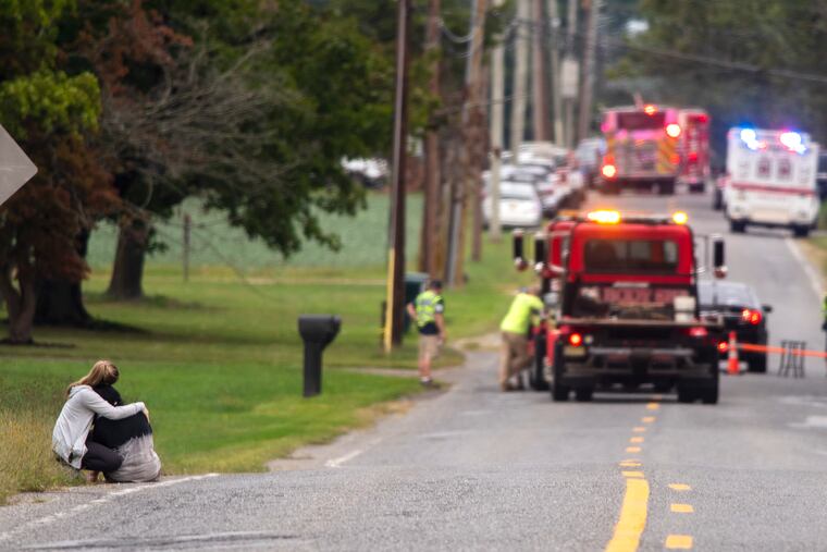 The scene in Upper Deerfield Township, Cumberland County, where two people were killed Monday when their small single-engine plane crashed in the front yard of a home on Parvin Mill Road.