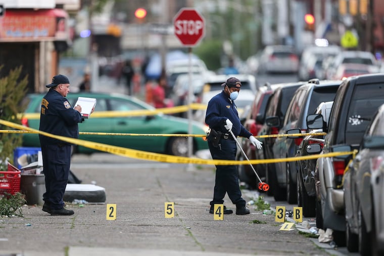 Philadelphia Police crime scene unit investigate a homicide at "F" street and Cornwell street where a 43-year-old man was shot multiple times.